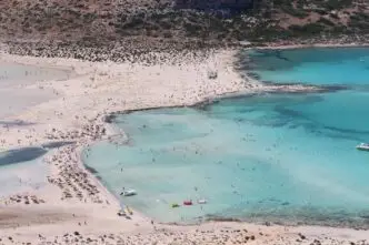 A breathtaking aerial view of Balos Beach in Crete, showcasing its turquoise waters and sandy shores.