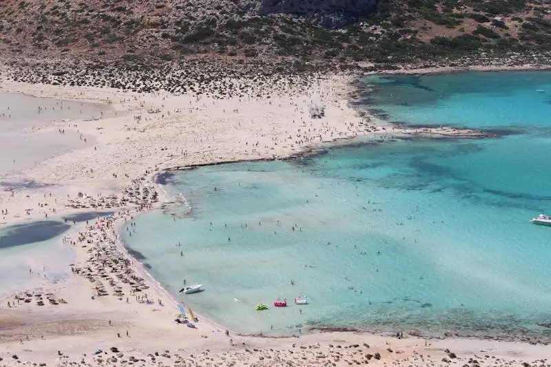 A breathtaking aerial view of Balos Beach in Crete, showcasing its turquoise waters and sandy shores.